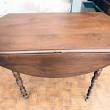 table ronde ancienne avec rabats